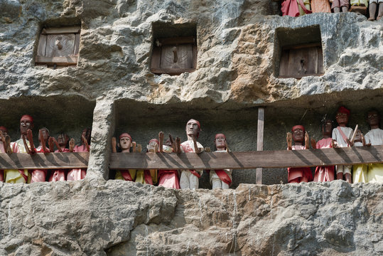 Wooden Statues Of Tau Tau. Lemo is cliffs old burial site in Tana Toraja. South Sulawesi, Indonesia