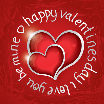 Valentines day round lettering with two red hearts.