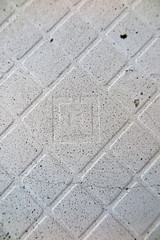 Dried tile adhesive on the cottage wall