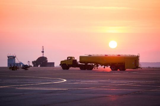 airport refueler truck sunset