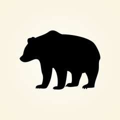 silhouette bear on a cream background,vector illustration