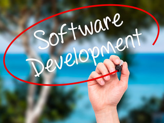 Man Hand writing Software Development with black marker on visua