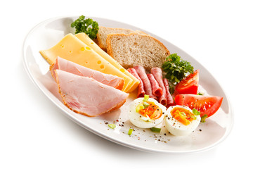 Breakfast - boiled egg, ham, cheese and vegetables 