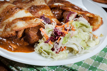 Potato pancakes with meat stew