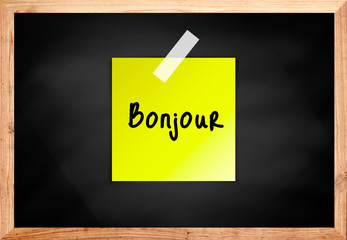 Bonjour on wood blackboard in black color © 2nix