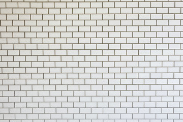 White brick wall background in rural room, grungy rusty blocks o