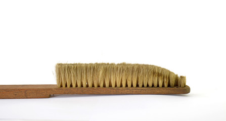 Old dirty wooden brush