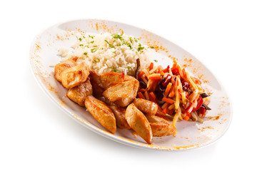 Chicken nuggets, white rice and vegetables