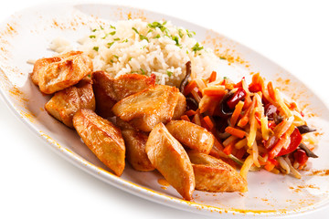 Chicken nuggets, white rice and vegetables