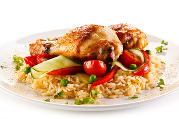 Roasted chicken drumsticks white rice and vegetables