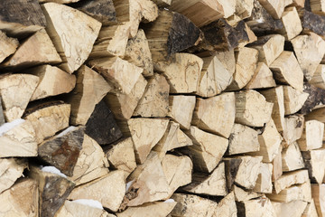 Compared pile of wooden logs