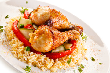 Roasted chicken drumsticks white rice and vegetables