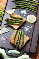 Asparagus sandwiches on cast iron table