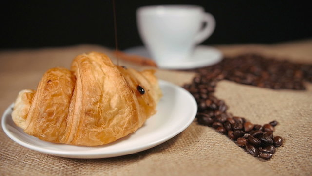 Pouring a Chocolate on Croissant
