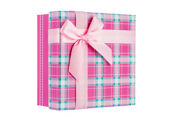 Pink gift box with ribbon, shallow depth of field