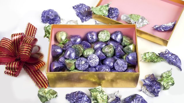 Time lapse footage of eating a box of chocolates
