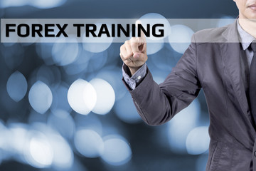 Business man touch on screen concept Forex Training