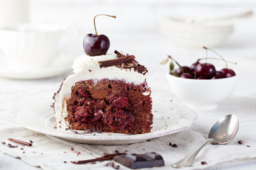 Black forest cake ,decorated with whipped cream and cherries Schwarzwald pie, dark chocolate and...