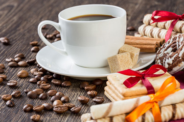 Biscuits and coffee on table