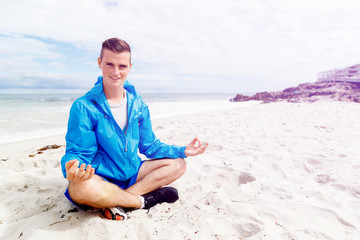 Man training on beach outside