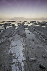 Long exposure during the warm light of an incredible sunset on the Garda lake in Sirmione