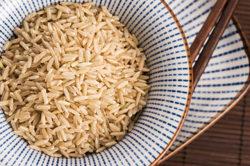 Raw brown rice in a bowl