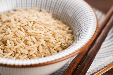 Raw brown rice in a bowl