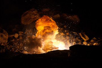 Explosion on the battlefield. Realistic fiery explosion inside an old ruined hall