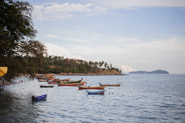 Fishing boats on the sea with blue sky background, Thailand.