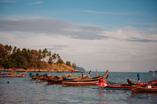 Fishing boats on the sea with blue sky background, Thailand.