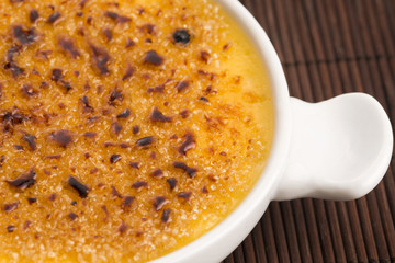 Creme brulee.French vanilla cream dessert with caramelised sugar