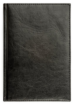 Closeup of texture leather notebook with stitching along edge