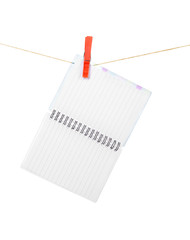 notebook on clothespins on white background
