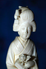 Japanese woman in traditional dress made of ivory