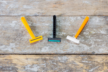 used razor blade on the wood table