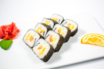 Salmon and caviar rolls served on a plate