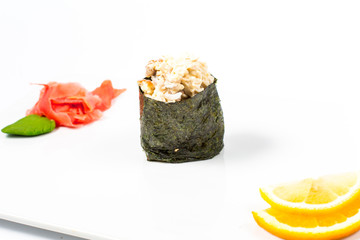 Salmon and caviar rolls served on a plate