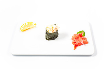 Salmon and caviar rolls served on a plate