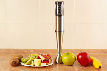 Fresh fruit and a blender to prepare vitamin smoothies