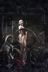 Obraz na płótnie Canvas fantasy killer evil girl and tentacles monster