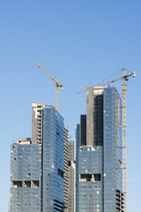 Fototapeta na wymiar Construction Of Skyscraper Blocks