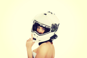 Sexy woman with motorcycle helmet.