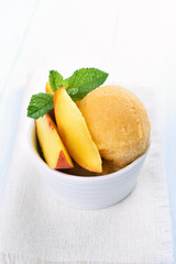Scoop of peach ice cream