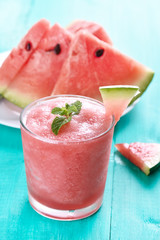 Watermelon sorbet in glass and slices