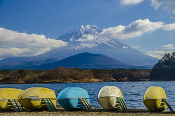Mt. Fuji at Lake Shojiko with boats in Japan