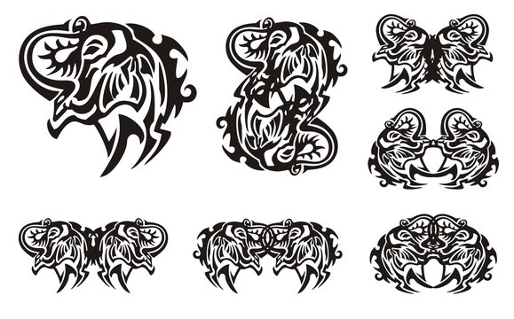 Tribal elephant head symbols. Muzzle of an elephant with the trunk lifted up and symbols from it
