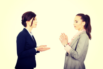 Two angry businesswomans.