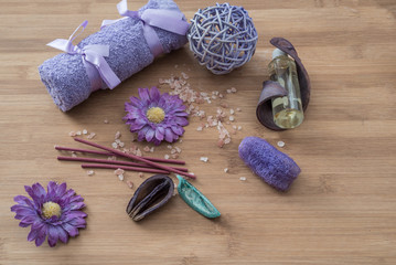 Spa concept. flowers,candles, aromatic salt,soap and bath purple