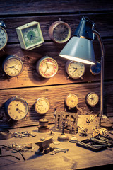 Watchmaker's workshop with many clocks