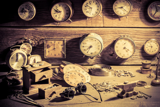 Watchmaker's workshop full of clocks